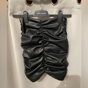Faux leather pleated skirt